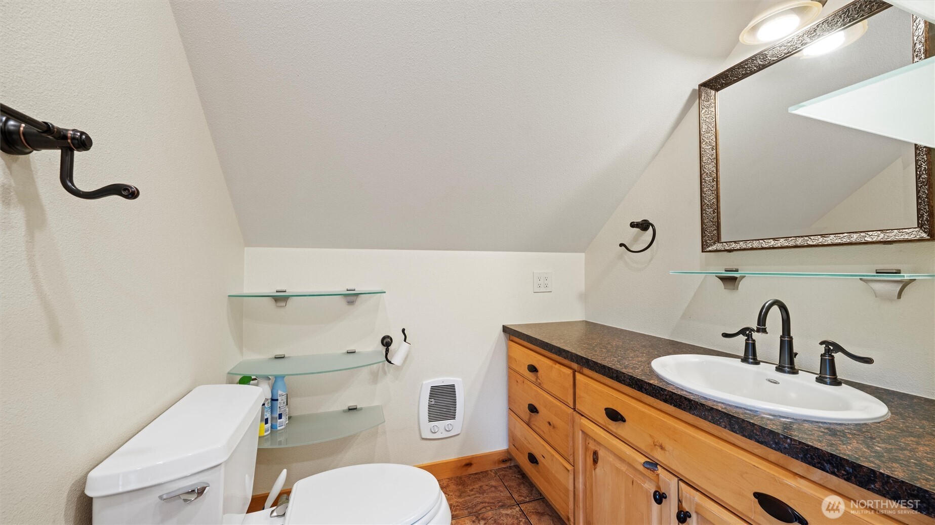 109 Cold Spring Lane Dayton, WA 99328 - Photo 20 of 40 a bathroom with a granite countertop toilet sink and mirror