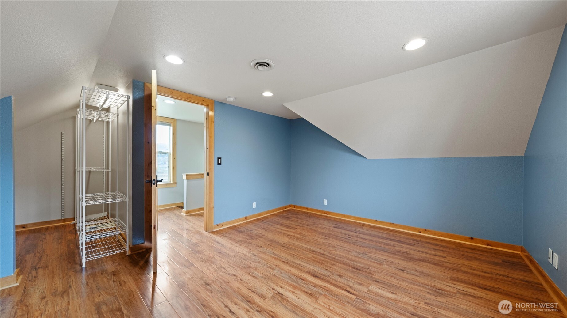 109 Cold Spring Lane Dayton, WA 99328 - Photo 23 of 40 a view of empty room with wooden floor