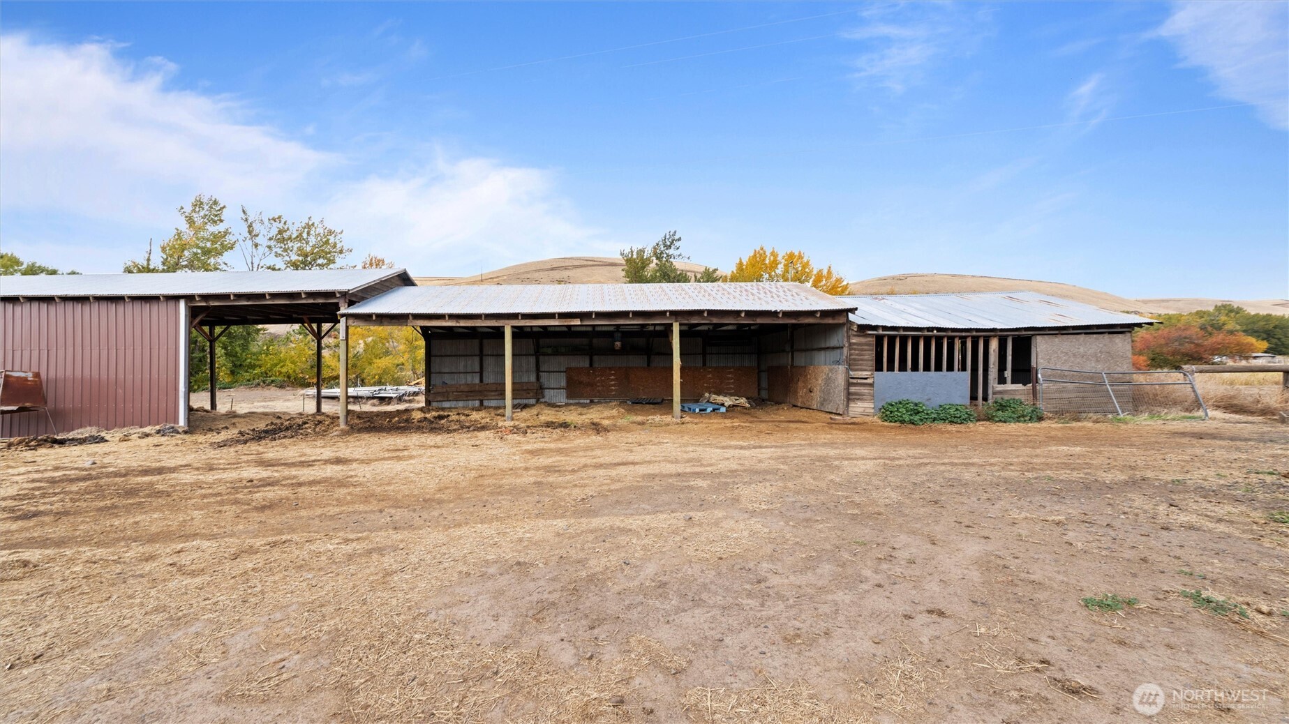 109 Cold Spring Lane Dayton, WA 99328 - Photo 26 of 40 a front view of a house with a yard and a garage