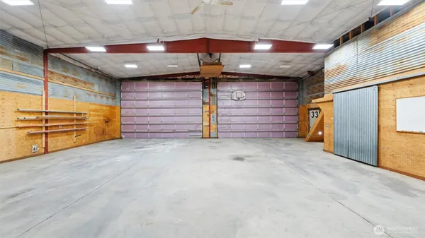 a view of a room with racks on the wall