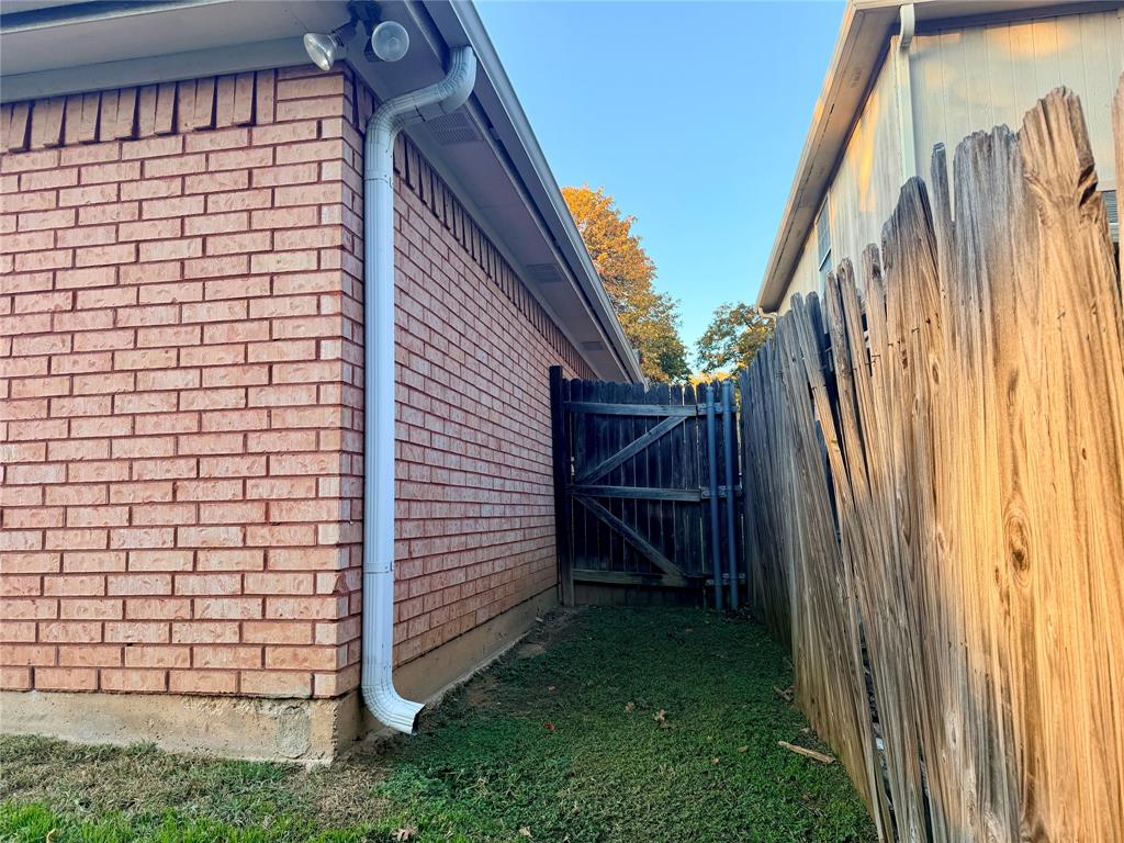 7632 Arbor Ridge Court Fort Worth, TX 76112 - Photo 19 of 19 a view of a house with a backyard