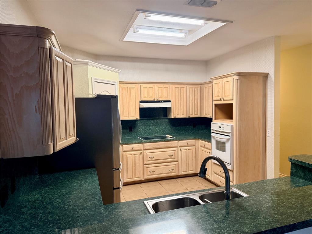 7632 Arbor Ridge Court Fort Worth, TX 76112 - Photo 5 of 19 a room with furniture a mirror and a window