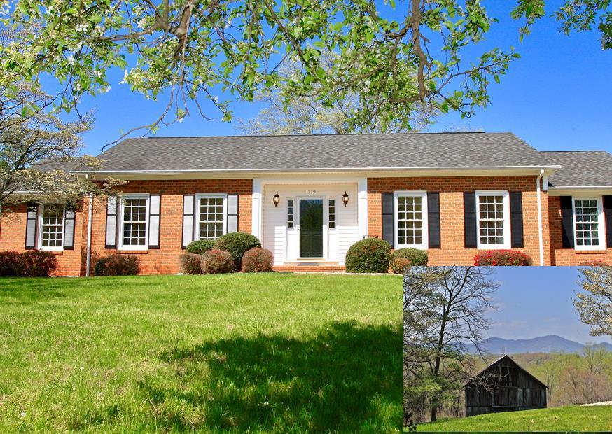 a view of a house with a yard porch and sitting area