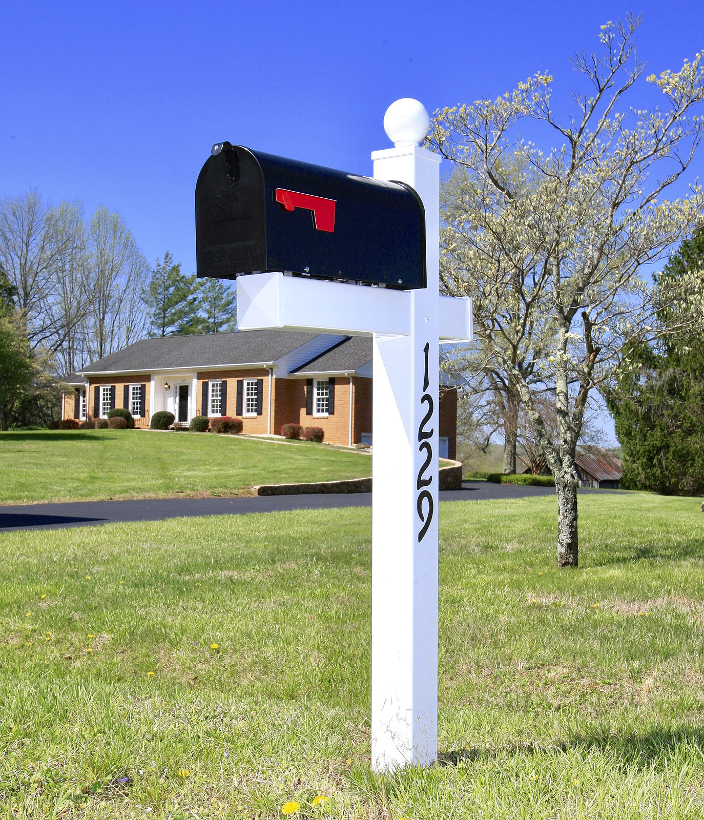 1229 Trails End Road Goodview, VA 24095 - Photo 4 of 106 a front view of a house with garden
