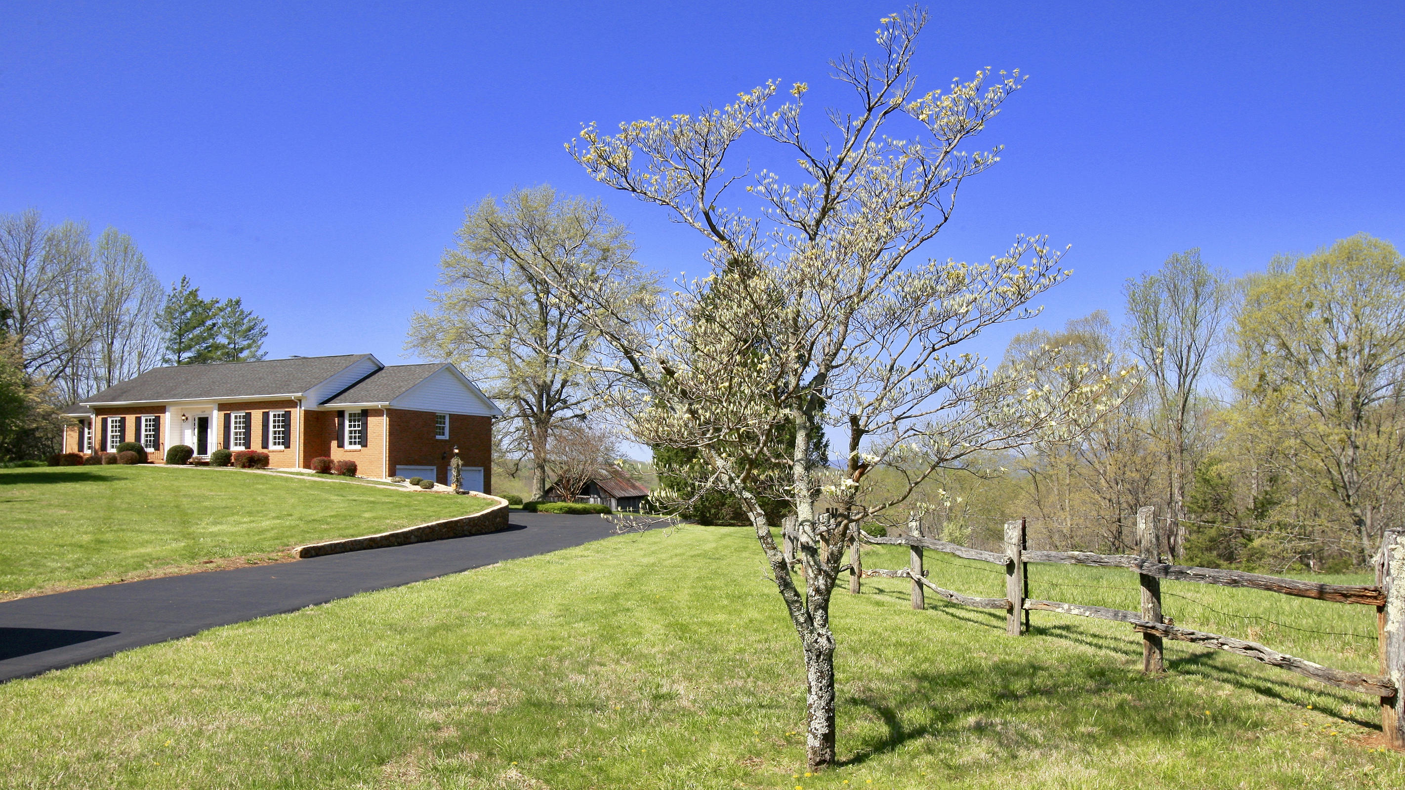 1229 Trails End Road Goodview, VA 24095 - Photo 5 of 106 a view of a house with a yard