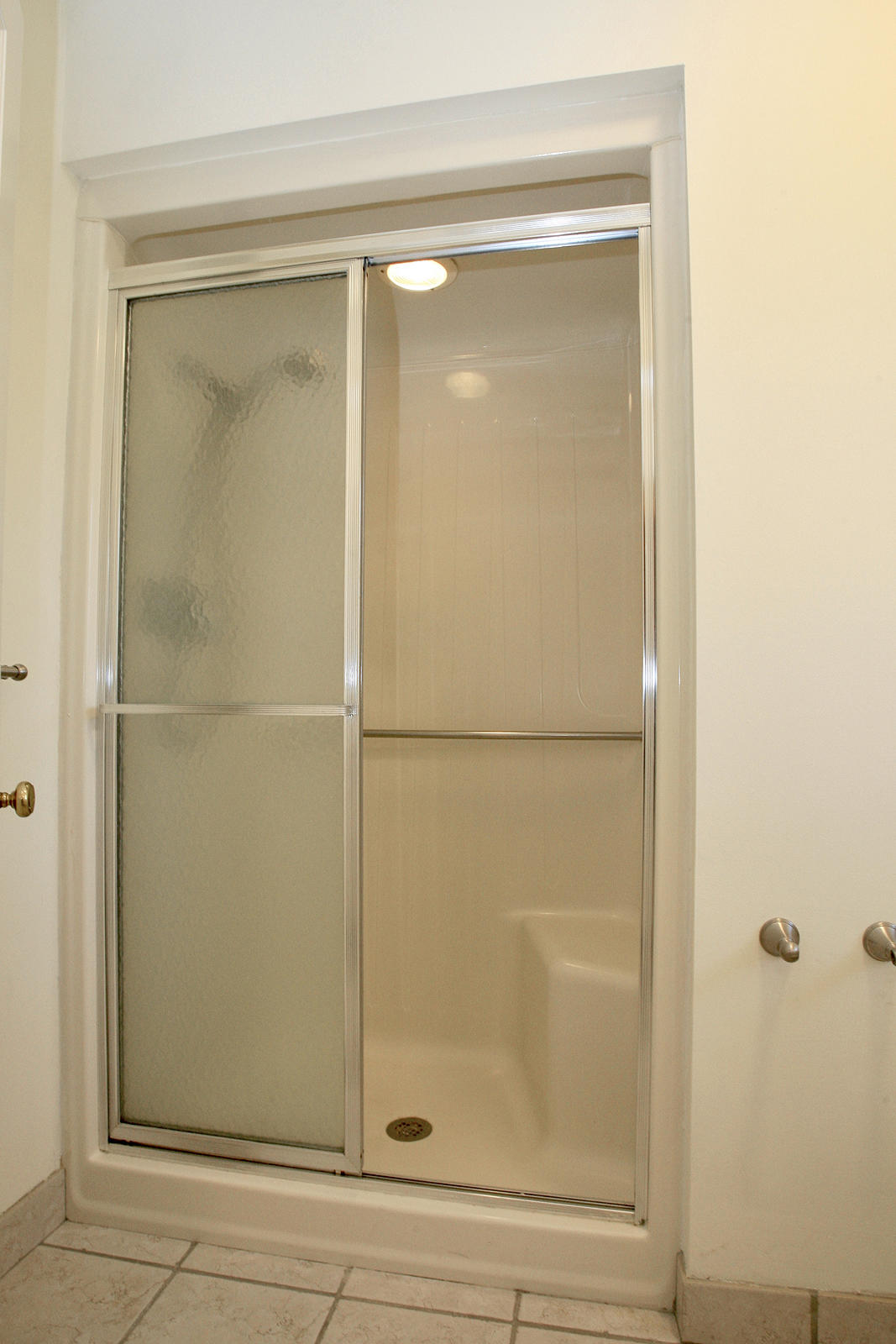 1229 Trails End Road Goodview, VA 24095 - Photo 58 of 106 a bathroom with a glass shower door