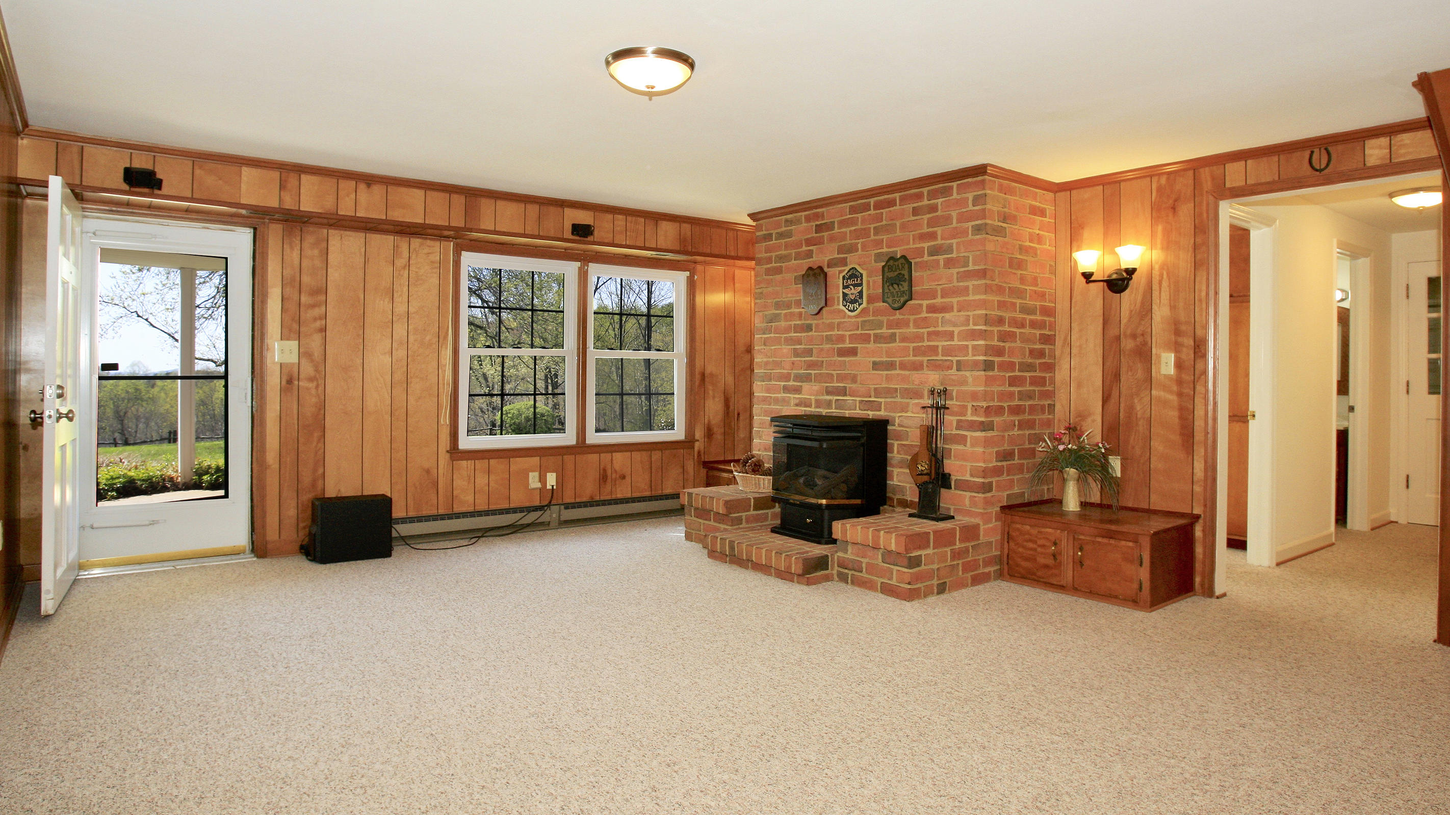 1229 Trails End Road Goodview, VA 24095 - Photo 68 of 106 a view of an empty room with furniture and a fireplace