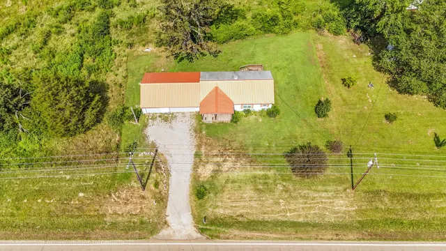 a view of a lake and a yard