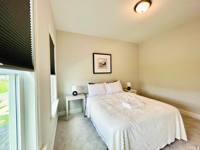 a picture of a room with a window