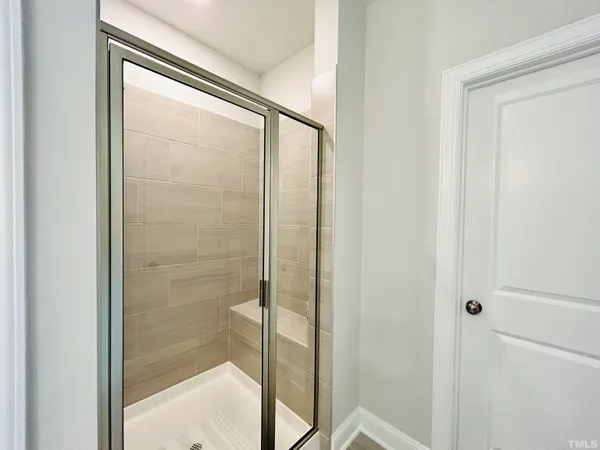 a bathroom with a toilet and a vanity
