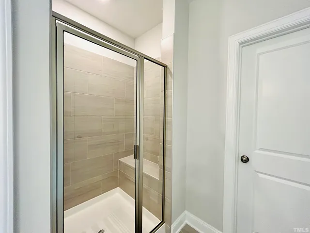a bathroom with a toilet and a vanity
