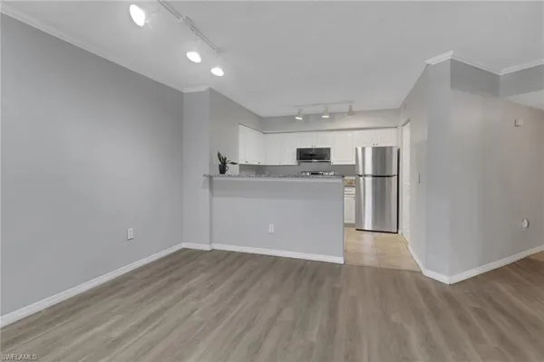 a view of kitchen with wooden floor
