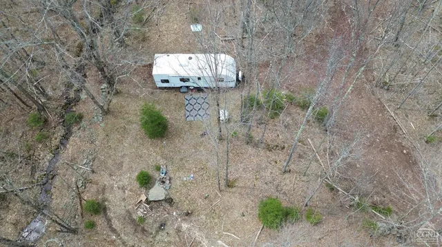 a view of a house with a mountain