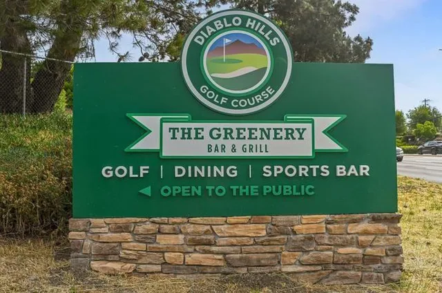 a sign that is on the side of a building