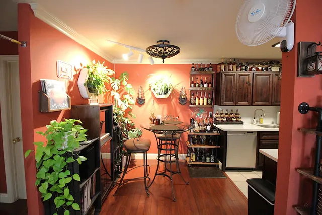 a view of a chairs and table in a patio