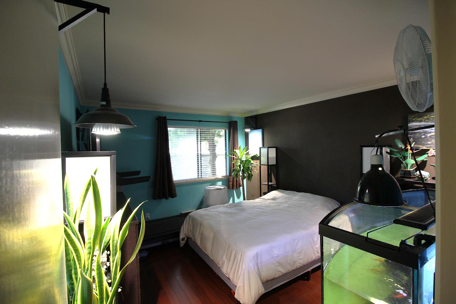 1457 Marchbanks Drive, Unit 1 Walnut Creek, CA 94598 - Photo 4 of 13 a bedroom with a bed table flowerpot and window