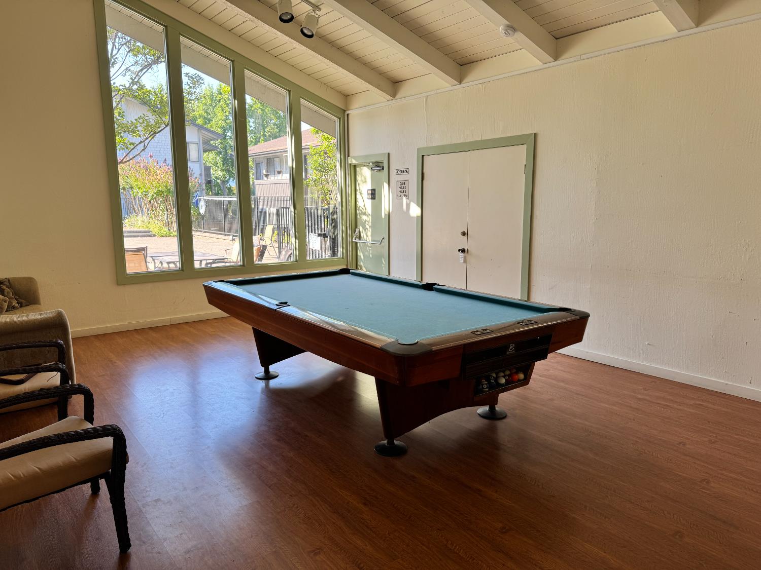 1457 Marchbanks Drive, Unit 1 Walnut Creek, CA 94598 - Photo 7 of 13 a room with pool table windows and wooden floor