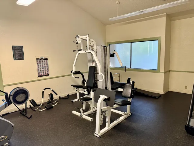 a view of a room with gym equipment