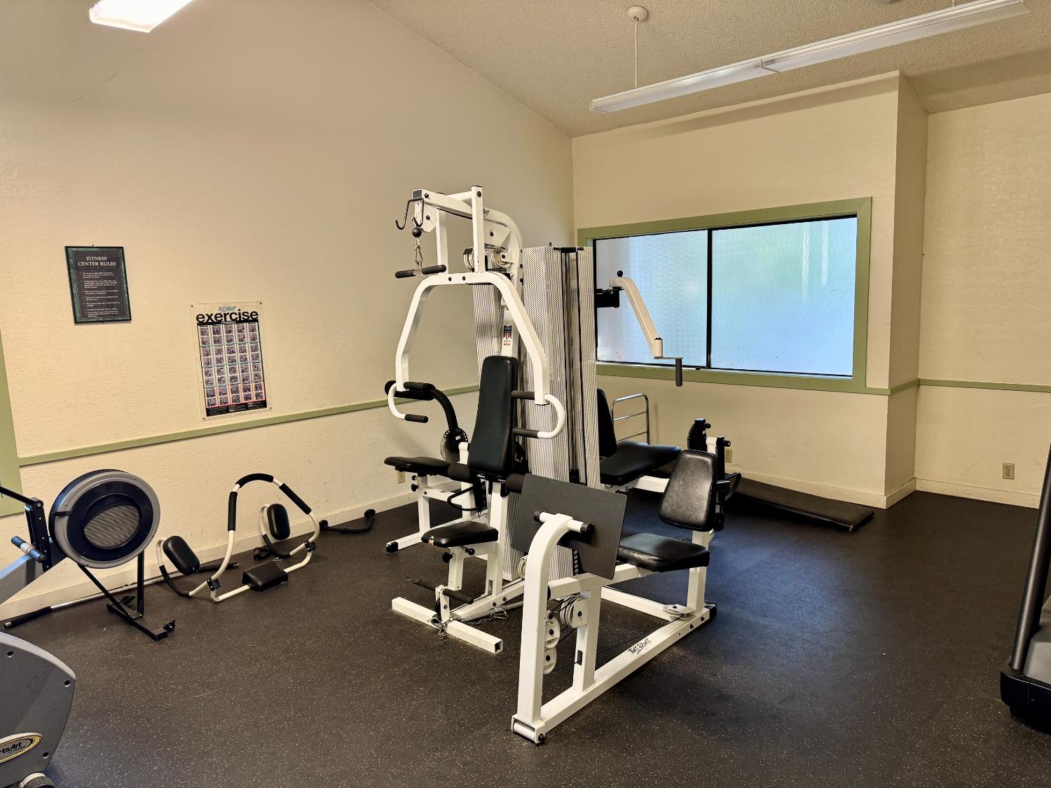 1457 Marchbanks Drive, Unit 1 Walnut Creek, CA 94598 - Photo 8 of 13 a view of a room with gym equipment