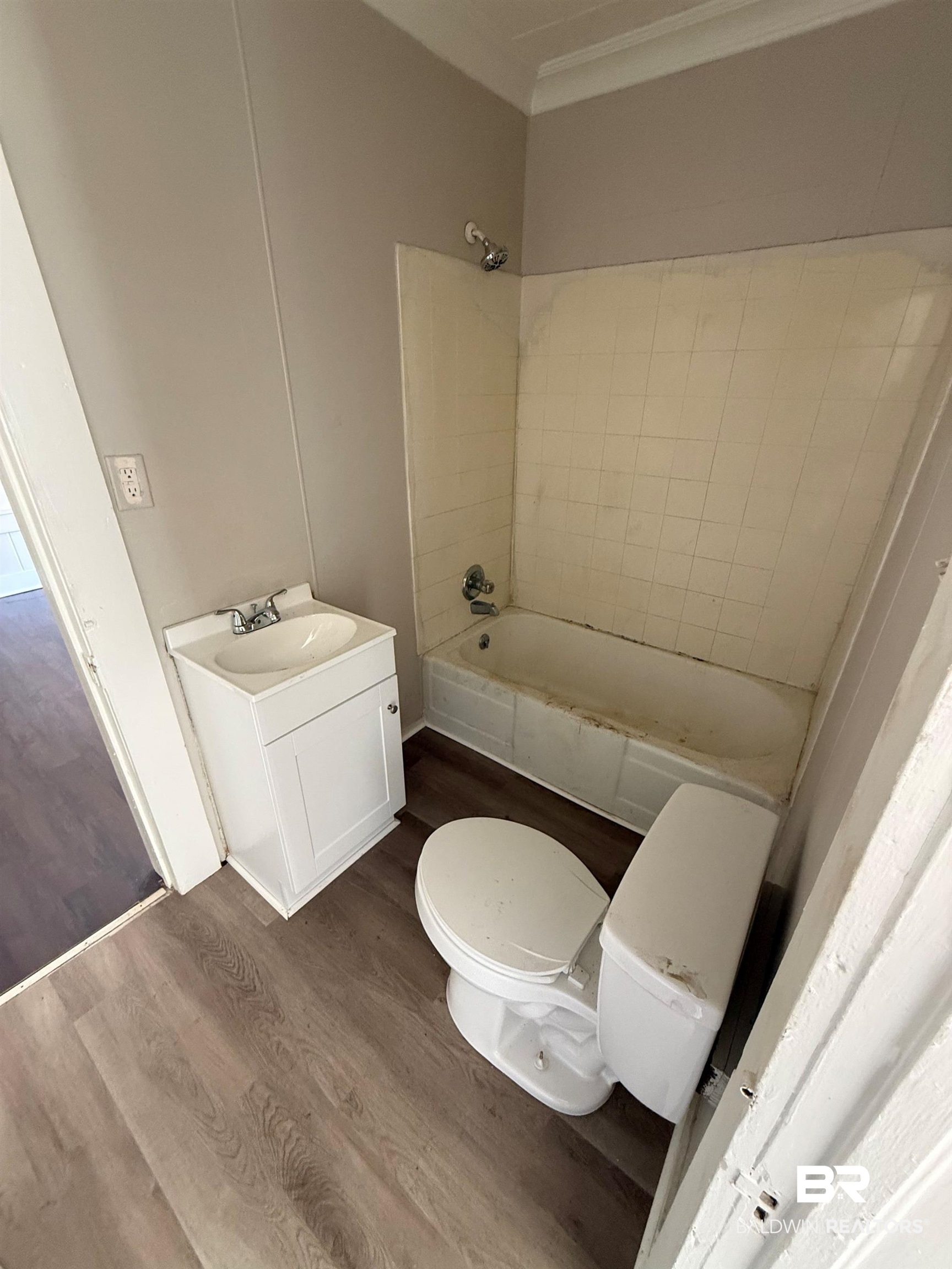 655 Mandrell Street Mobile, AL 36606 - Photo 9 of 12 Full bathroom featuring vanity, dark wood-type flooring, and crown molding