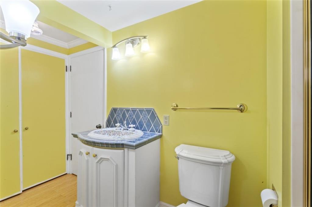 106 Sunset Street McKees Rocks, PA 15136 - Photo 15 of 45 a bathroom with a sink and a mirror