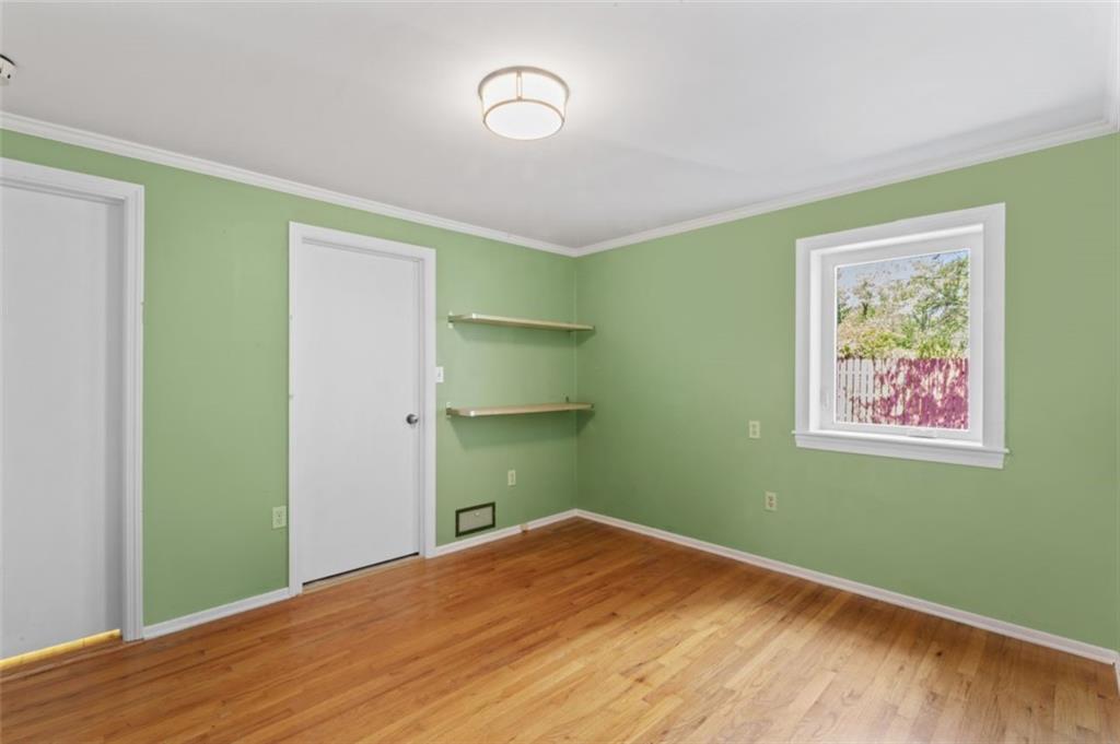 106 Sunset Street McKees Rocks, PA 15136 - Photo 17 of 45 a view of a room with wooden floor and closet