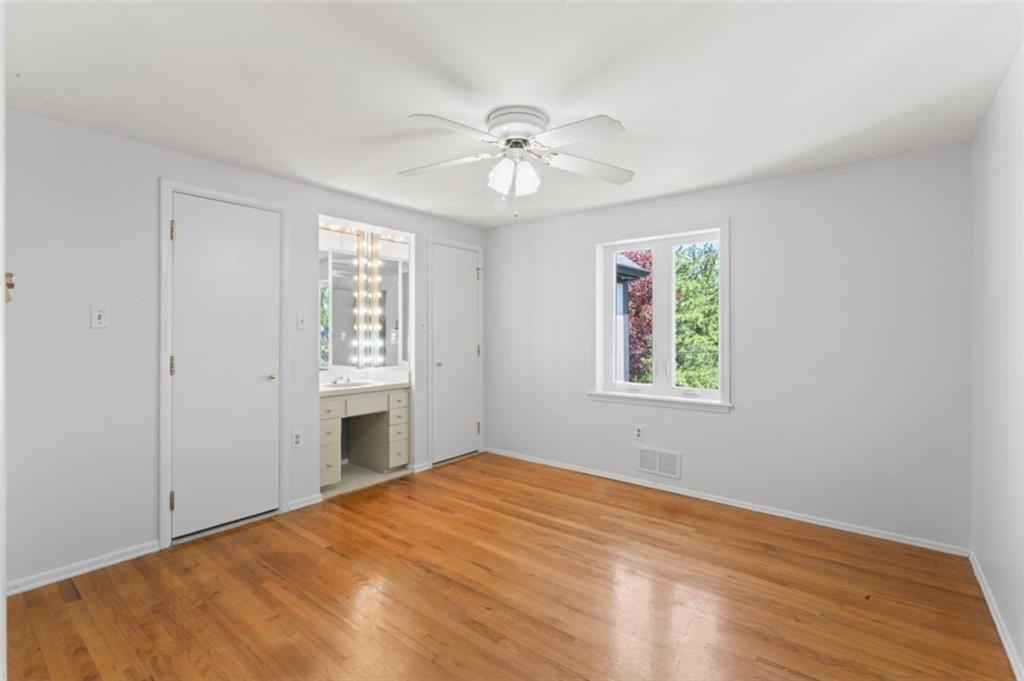 106 Sunset Street McKees Rocks, PA 15136 - Photo 18 of 45 a bedroom with a bed and a window