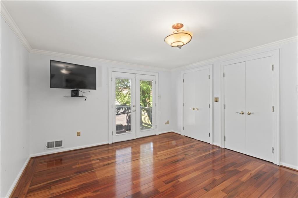 106 Sunset Street McKees Rocks, PA 15136 - Photo 22 of 45 a view of room with wooden floor and window