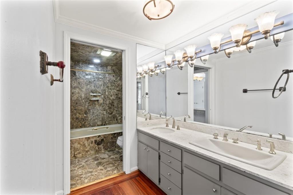 106 Sunset Street McKees Rocks, PA 15136 - Photo 24 of 45 a bathroom with a double vanity sink mirror and shower