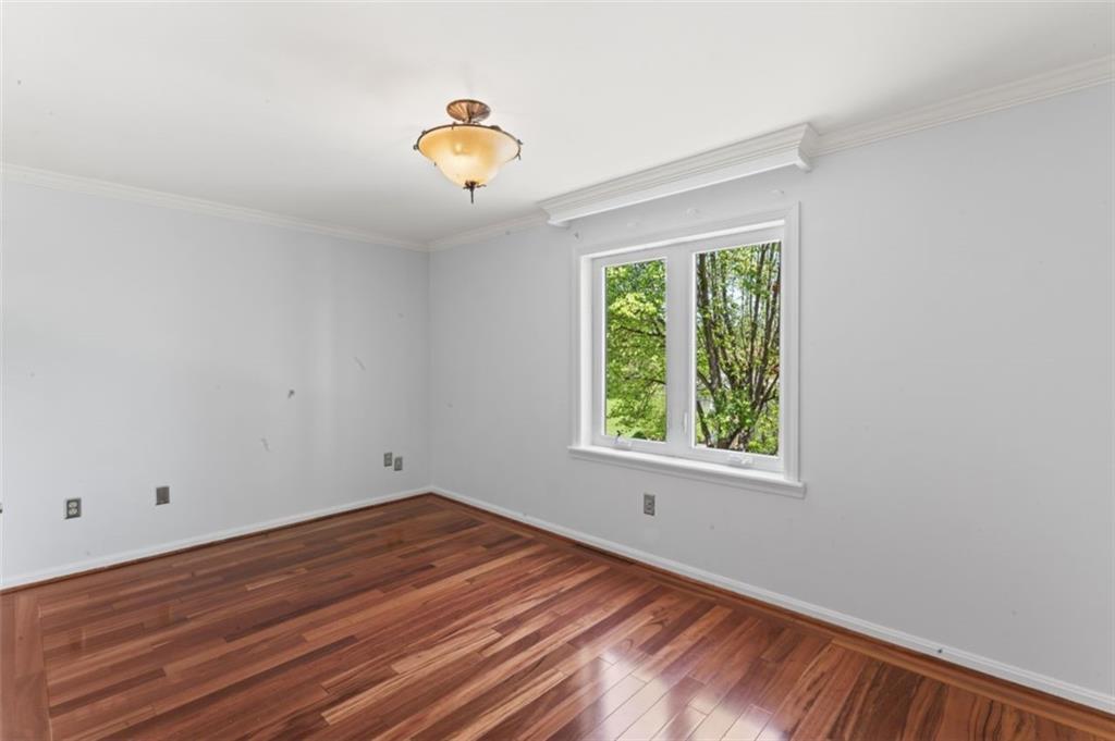 106 Sunset Street McKees Rocks, PA 15136 - Photo 27 of 45 a view of a room with wooden floor and window