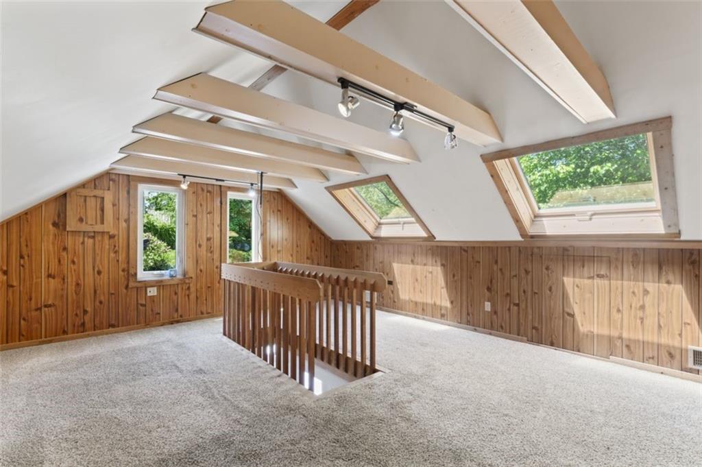 106 Sunset Street McKees Rocks, PA 15136 - Photo 28 of 45 an empty room with windows & a ceiling fan