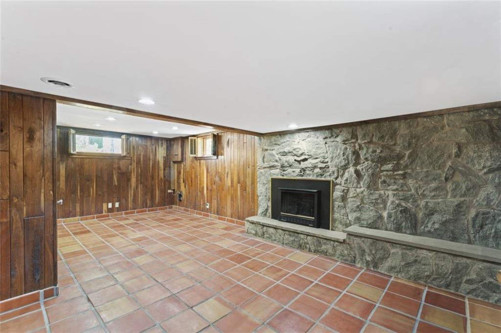106 Sunset Street McKees Rocks, PA 15136 - Photo 29 of 45 a view of an empty room with a fireplace