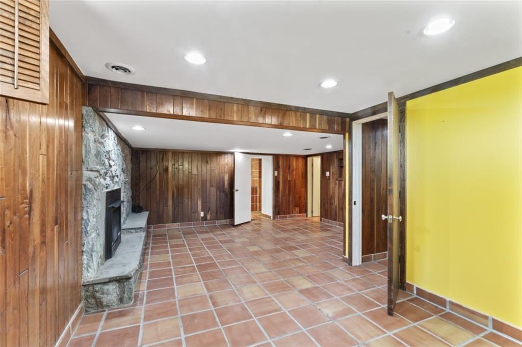 106 Sunset Street McKees Rocks, PA 15136 - Photo 30 of 45 a view of a hallway with wooden shelves