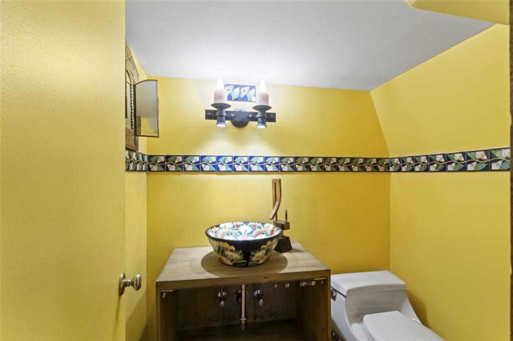 106 Sunset Street McKees Rocks, PA 15136 - Photo 31 of 45 a bathroom with a sink and a mirror