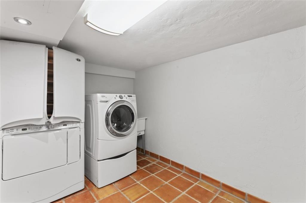 106 Sunset Street McKees Rocks, PA 15136 - Photo 32 of 45 a utility room with dryer and washer