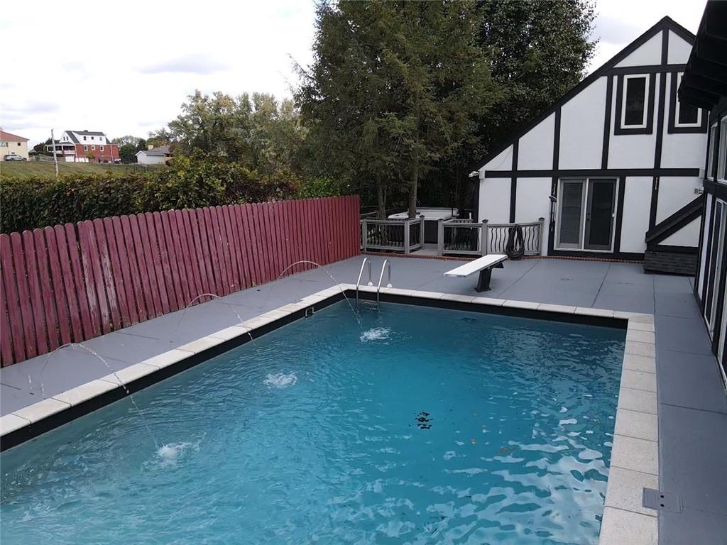 106 Sunset Street McKees Rocks, PA 15136 - Photo 4 of 45 a view of a backyard with sitting area