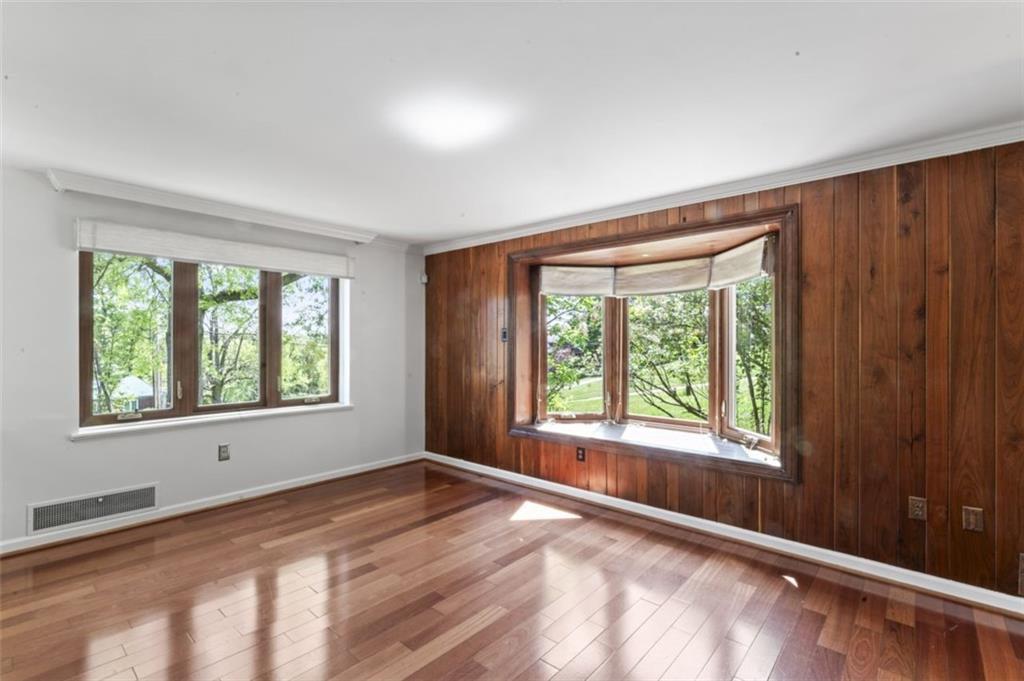 106 Sunset Street McKees Rocks, PA 15136 - Photo 8 of 45 a view of an empty room with a window