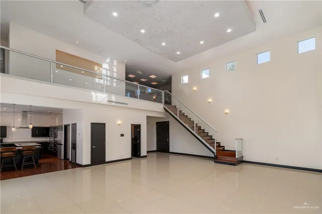 a view of an empty room with closet