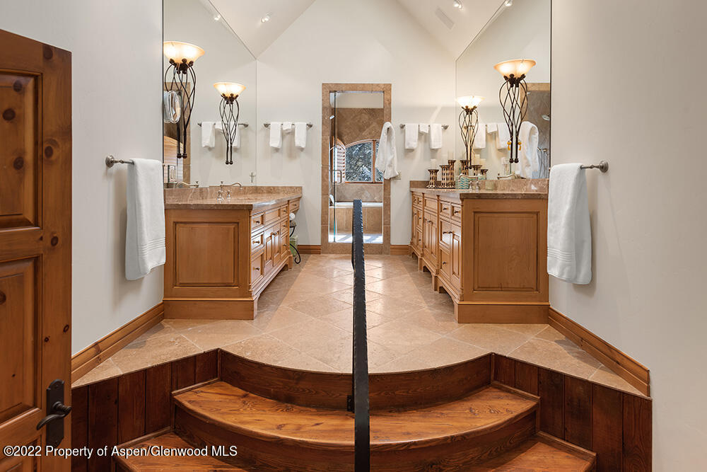 165 Miners Trail Road Aspen, CO 81611 - Photo 11 of 23 a spacious bathroom with a sink and mirror