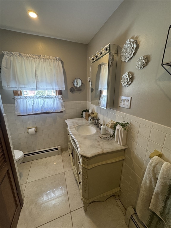 2 Blacksnake Road Salisbury, MA 01952 - Photo 14 of 31 a bathroom with a sink toilet and mirror