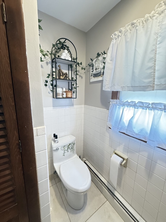 2 Blacksnake Road Salisbury, MA 01952 - Photo 16 of 31 a bathroom with a toilet and a shower curtain