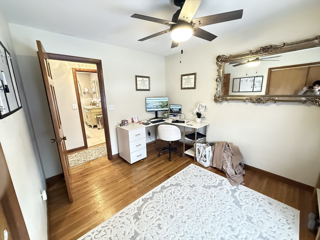 2 Blacksnake Road Salisbury, MA 01952 - Photo 28 of 31 a living room with furniture and a flat screen tv