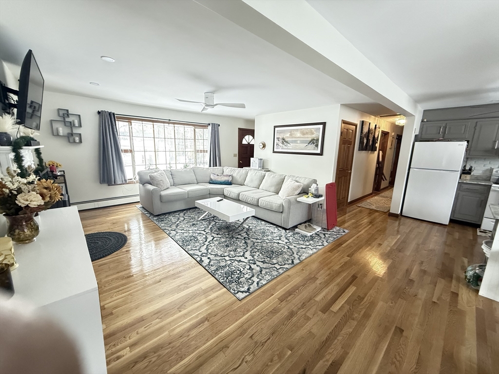 2 Blacksnake Road Salisbury, MA 01952 - Photo 3 of 31 a living room with furniture and wooden floor