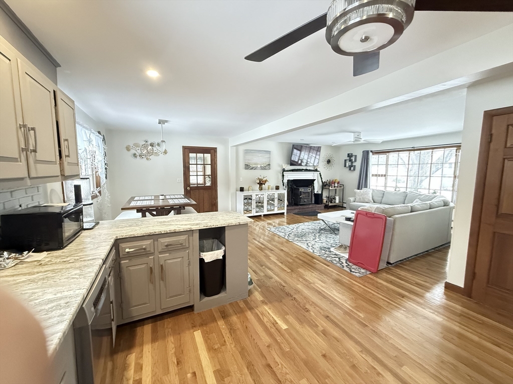 2 Blacksnake Road Salisbury, MA 01952 - Photo 9 of 31 a large kitchen with stainless steel appliances granite countertop a stove and cabinets