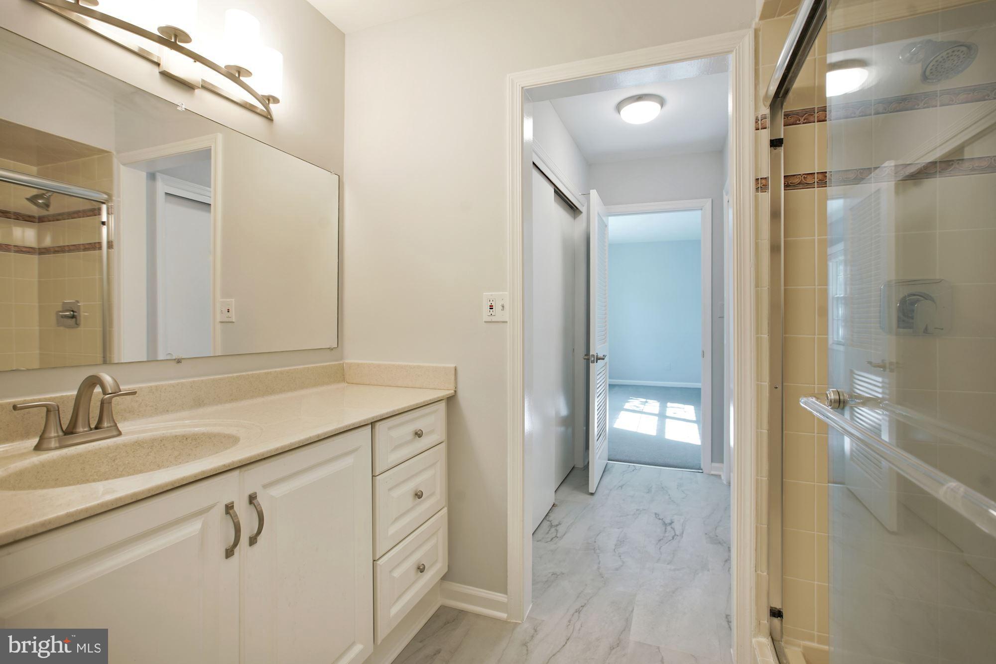 6002 Waterbury Court Springfield, VA 22152 - Photo 22 of 31 Primary Bathroom with new flooring