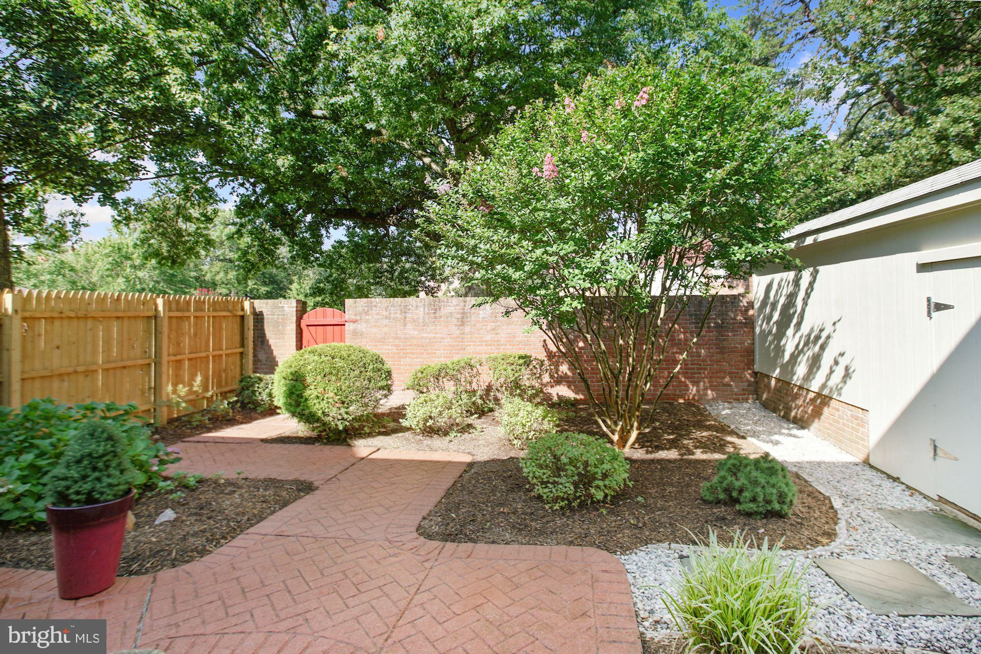 6002 Waterbury Court Springfield, VA 22152 - Photo 28 of 31 Patio with secure storage and privacy fence