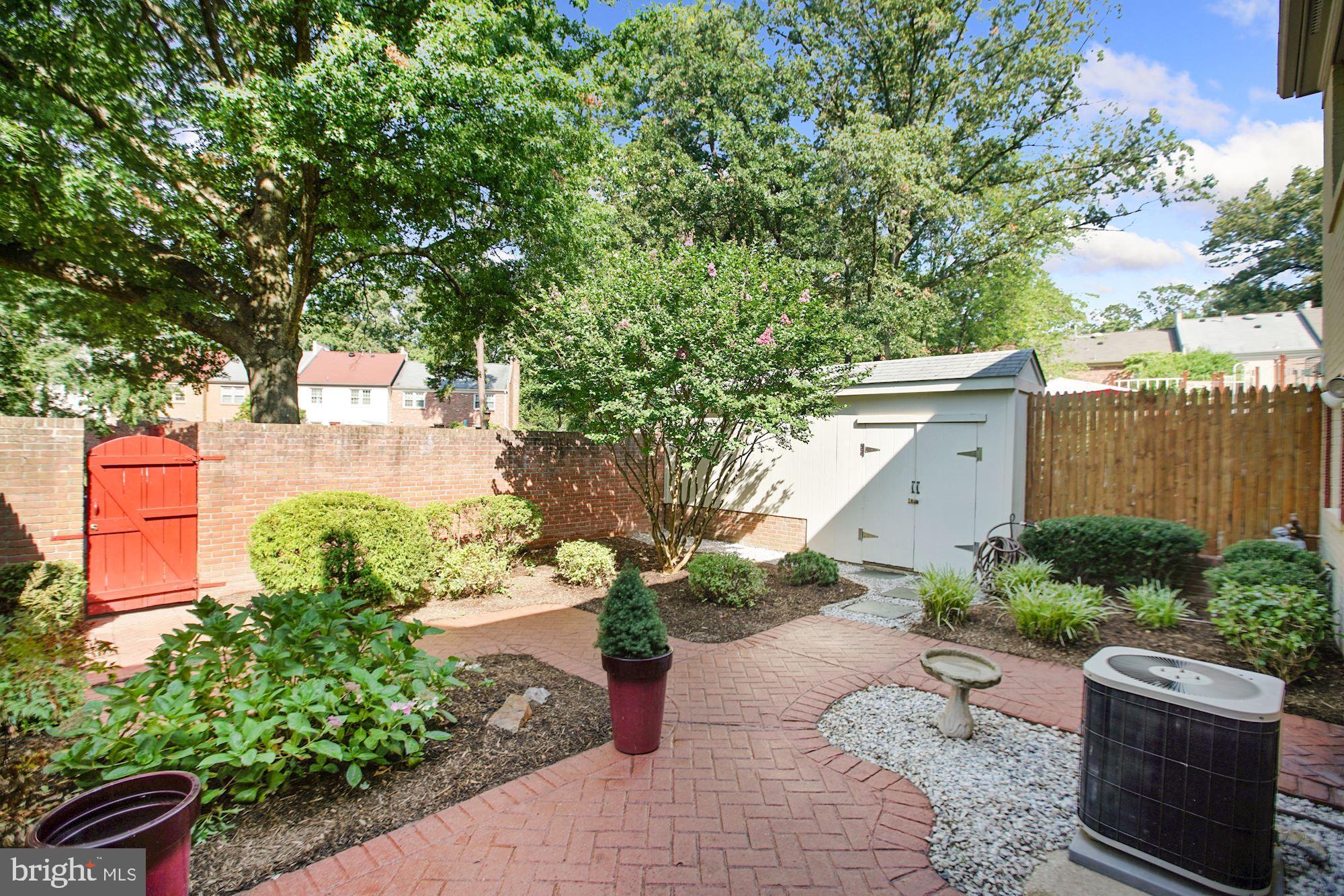 6002 Waterbury Court Springfield, VA 22152 - Photo 29 of 31 Privacy fenced rear patio with lovely plantings