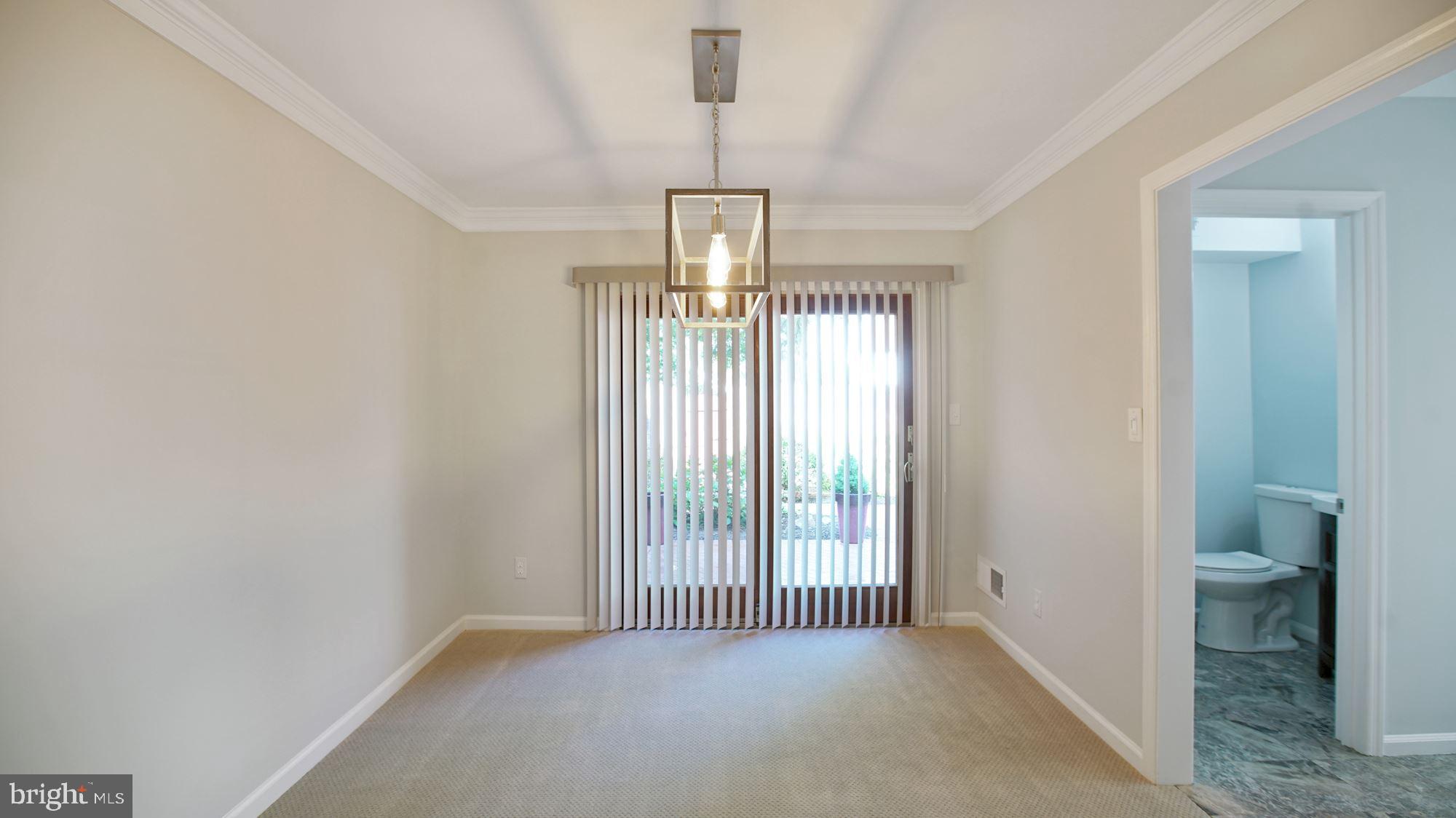 6002 Waterbury Court Springfield, VA 22152 - Photo 10 of 31 Dining Room w/ new modern chandelier & new blinds
