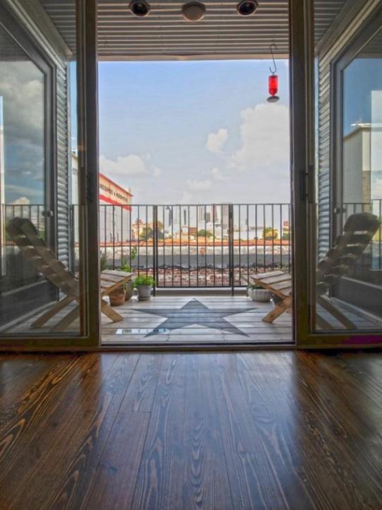 320 Peters Street Southwest, Unit 10 Atlanta, GA 30313 - Photo 18 of 20 a view of empty room with wooden floor