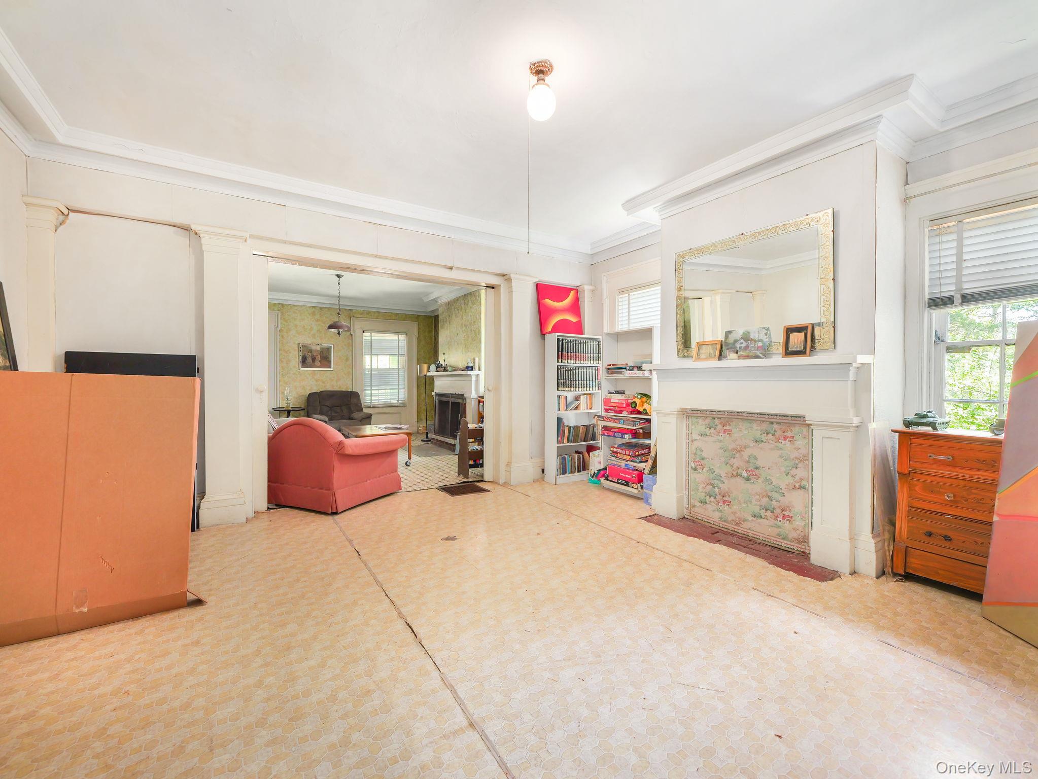 19 Oakland Valley Road Cuddebackville, NY 12729 - Photo 11 of 30 a spacious bedroom with a bed and a fireplace